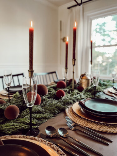 A holiday tablescape using red, brown and green #christmastablescape #christmastabledecorations #holidaytablescape #marlydiceblog