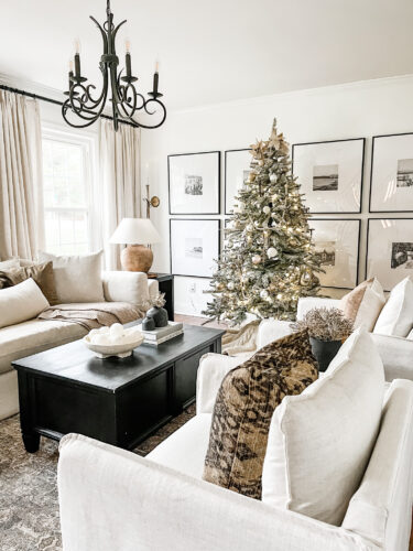 Flocked Christmas tree and neutral Christmas tree decor in our sitting room! #neutralchristmasdecor #neutralchristmastree