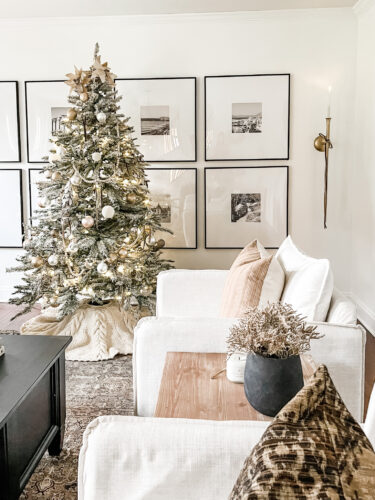 Flocked Christmas tree and neutral Christmas tree decor in our sitting room! #neutralchristmasdecor #neutralchristmastree