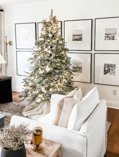 Flocked Christmas tree and neutral Christmas tree decor in our sitting room! #neutralchristmasdecor #neutralchristmastree