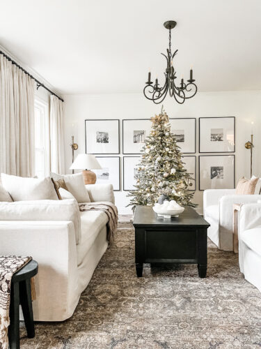 Flocked Christmas tree and neutral Christmas tree decor in our sitting room! #neutralchristmasdecor #neutralchristmastree