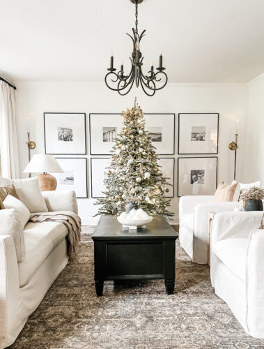 Flocked Christmas tree and neutral Christmas tree decor in our sitting room! #neutralchristmasdecor #neutralchristmastree