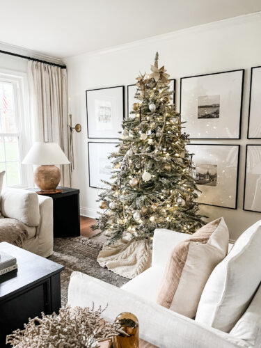 Flocked Christmas tree and neutral Christmas tree decor in our sitting room! #neutralchristmasdecor #neutralchristmastree