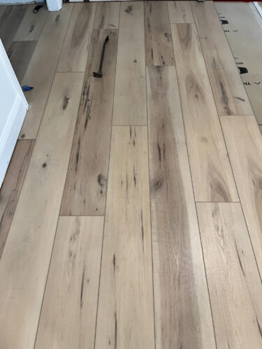 LVP Flooring: Learn our install process, why I love LVP flooring with kids and how well our luxury vinyl plank flooring is holding up with a busy family #lvpflooring #flooret