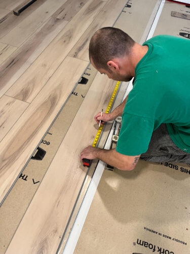 LVP Flooring: Learn our install process, why I love LVP flooring with kids and how well our luxury vinyl plank flooring is holding up with a busy family #lvpflooring #flooret