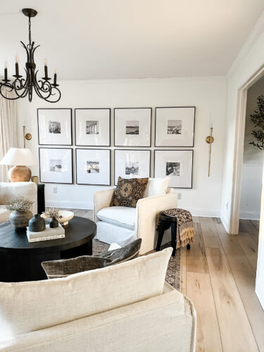 How to layout a living room with a round coffee table, black round coffee table, elegant living room #roundcoffeetable