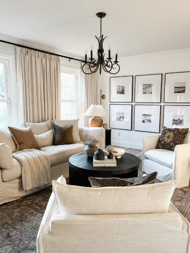 How to layout a living room with a round coffee table, black round coffee table, elegant living room #roundcoffeetable