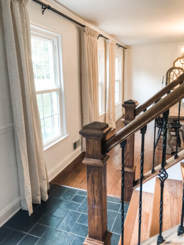 DIY Staircase Makeover using LVP flooring and paint! See the before and after plus a video!