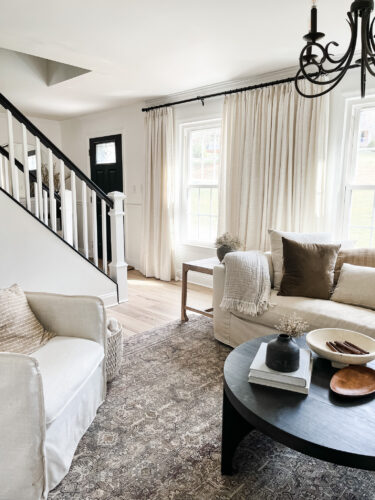 DIY Staircase Makeover using LVP flooring and paint! See the before and after plus a video!