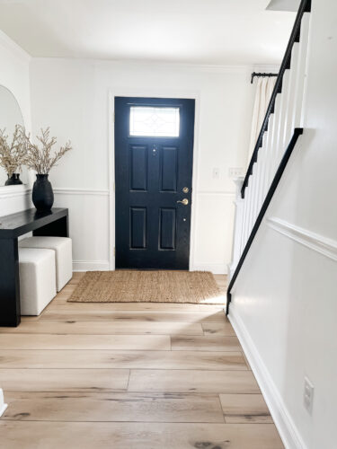 DIY Staircase Makeover using LVP flooring and paint! See the before and after plus a video!