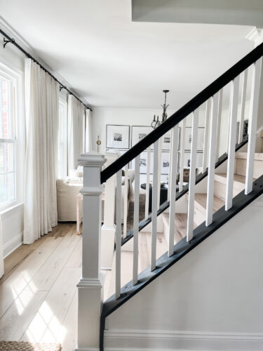 DIY Staircase Makeover using LVP flooring and paint! See the before and after plus a video!