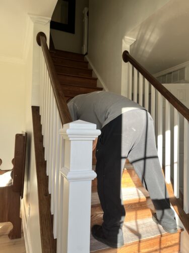 DIY Staircase Makeover using LVP flooring and paint! See the before and after plus a video!