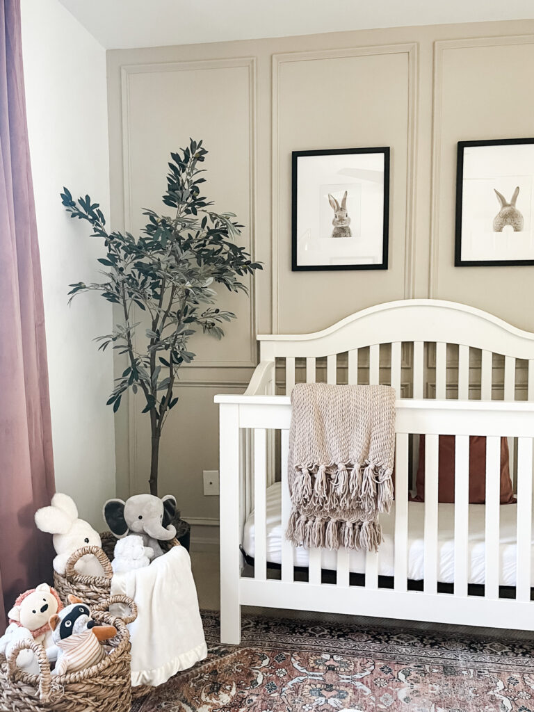 Ideas for a neutral baby girl nursery with rose colored accents