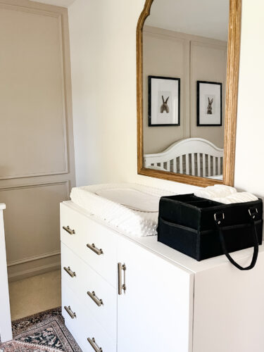 Ideas for a neutral baby girl nursery with rose colored accents