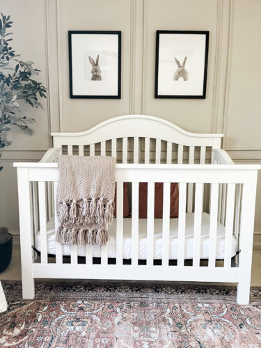 Ideas for a neutral baby girl nursery with rose colored accents