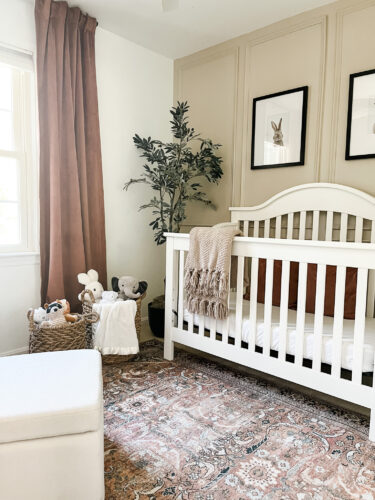 Ideas for a neutral baby girl nursery with rose colored accents