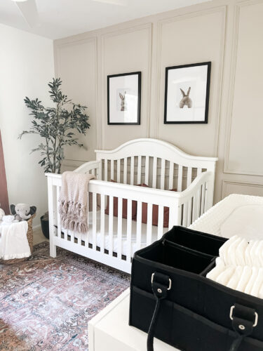 Ideas for a neutral baby girl nursery with rose colored accents