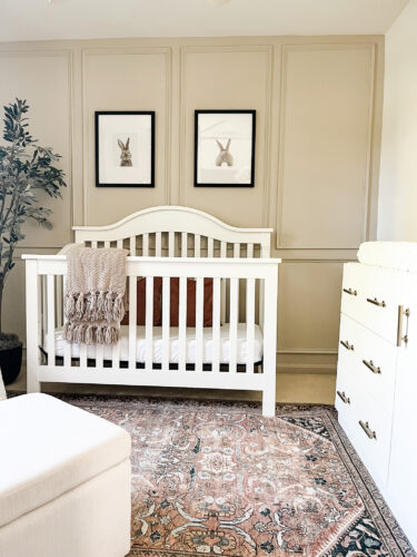 Ideas for a neutral baby girl nursery with rose colored accents