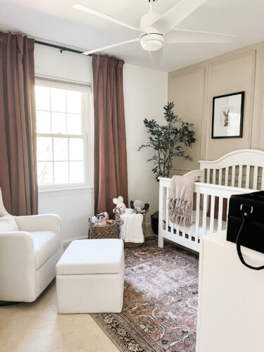 Ideas for a neutral baby girl nursery with rose colored accents