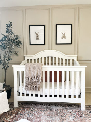 Ideas for a neutral baby girl nursery with rose colored accents