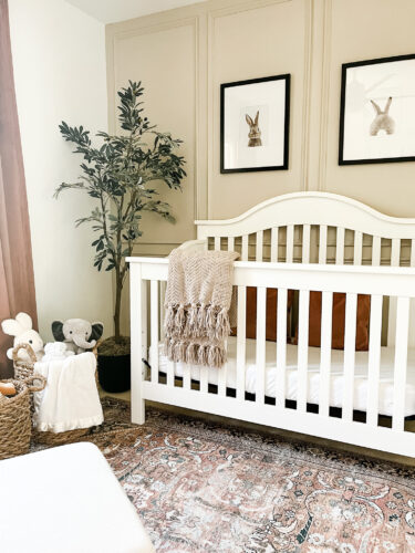 Ideas for a neutral baby girl nursery with rose colored accents