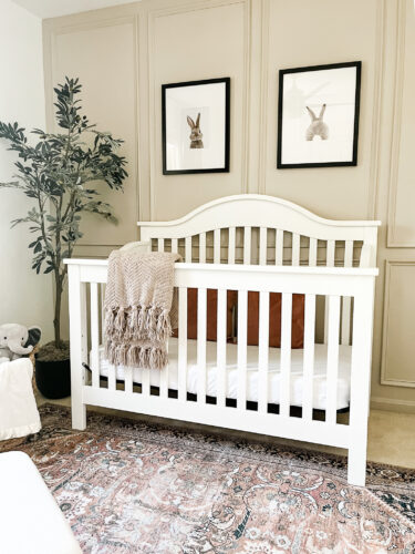Ideas for a neutral baby girl nursery with rose colored accents