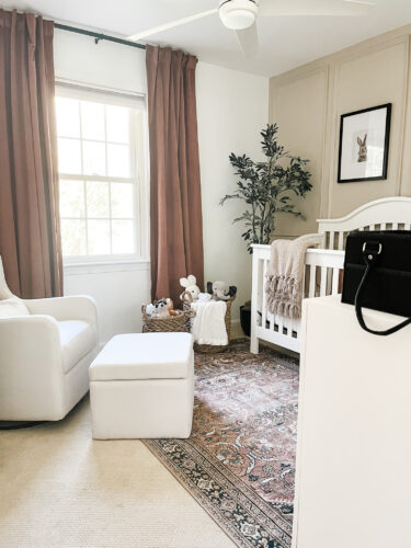 Ideas for a neutral baby girl nursery with rose colored accents