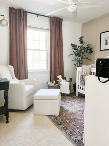 Ideas for a neutral baby girl nursery with rose colored accents