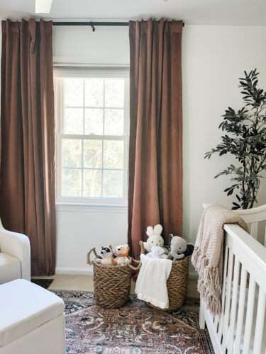 Ideas for a neutral baby girl nursery with rose colored accents