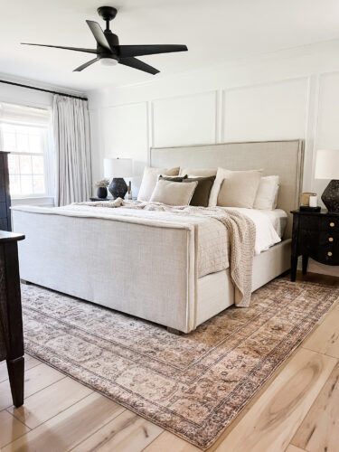 Black and white transitional bedroom with neutral bed & decor, Sophisticated modern bedroom ideas