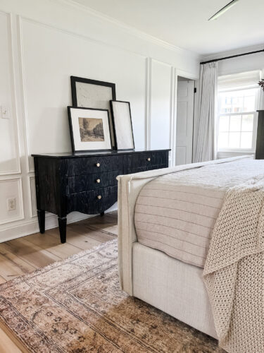 Black and white transitional bedroom with neutral bed & decor, Sophisticated modern bedroom ideas