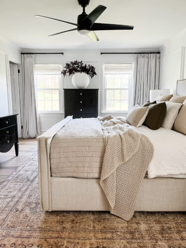 Black and white transitional bedroom with neutral bed & decor, Sophisticated modern bedroom ideas