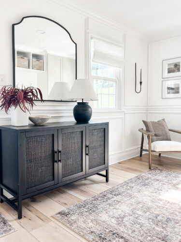 Functional mudroom ideas + picture frame moulding addition in our mudroom entryway.