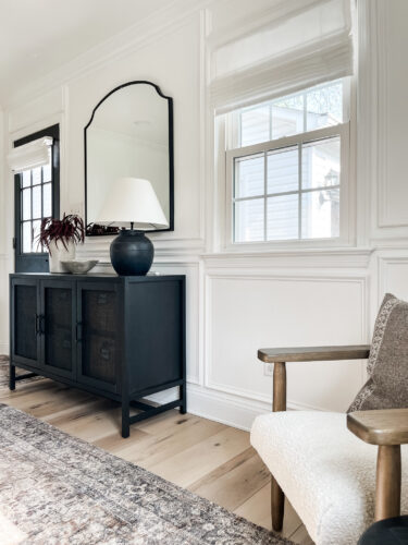 Functional mudroom ideas + picture frame moulding addition in our mudroom entryway.