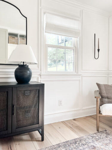 Functional mudroom ideas + picture frame moulding addition in our mudroom entryway.