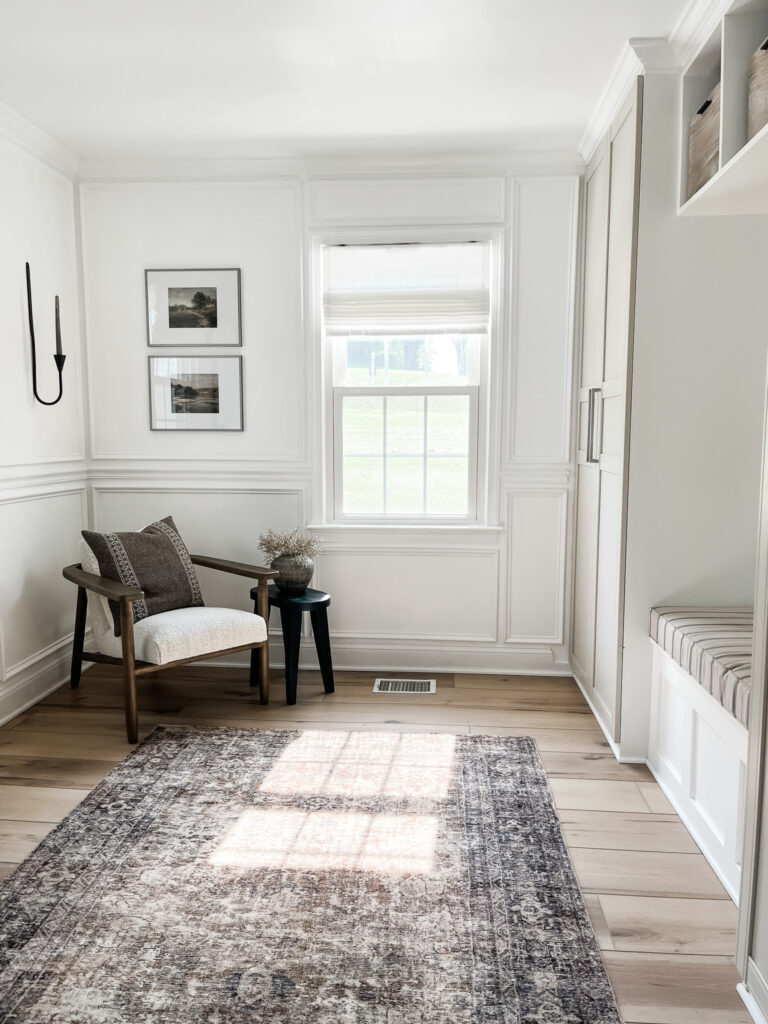 Functional mudroom ideas + picture frame moulding addition in our mudroom entryway.