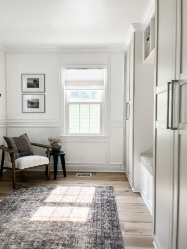Functional mudroom ideas + picture frame moulding addition in our mudroom entryway.